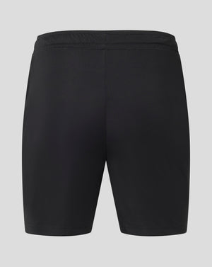 Back view of black Mens Match Short showing elastic waistband and small white Castore logo at the hem