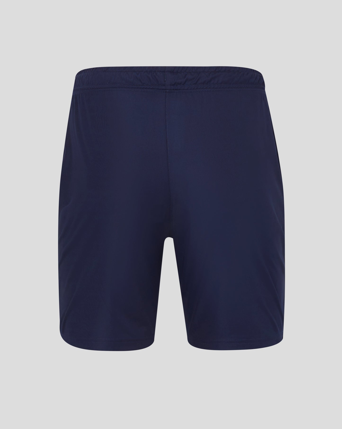 Rear view of navy shorts showing waistband and small Castore logo on the lower leg