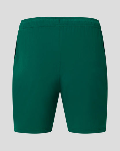 Back view of Botanical Garden green woven training shorts with elastic waistband and central seam.