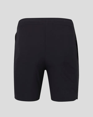 Back view of black Mens Woven Training Short with Castore logo on lower right leg