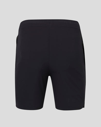Back view of black Mens Woven Training Short with Castore logo on lower right leg
