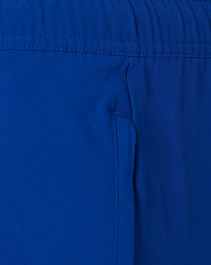 Close up of blue waistband area on woven shorts with stitching and gathered fabric