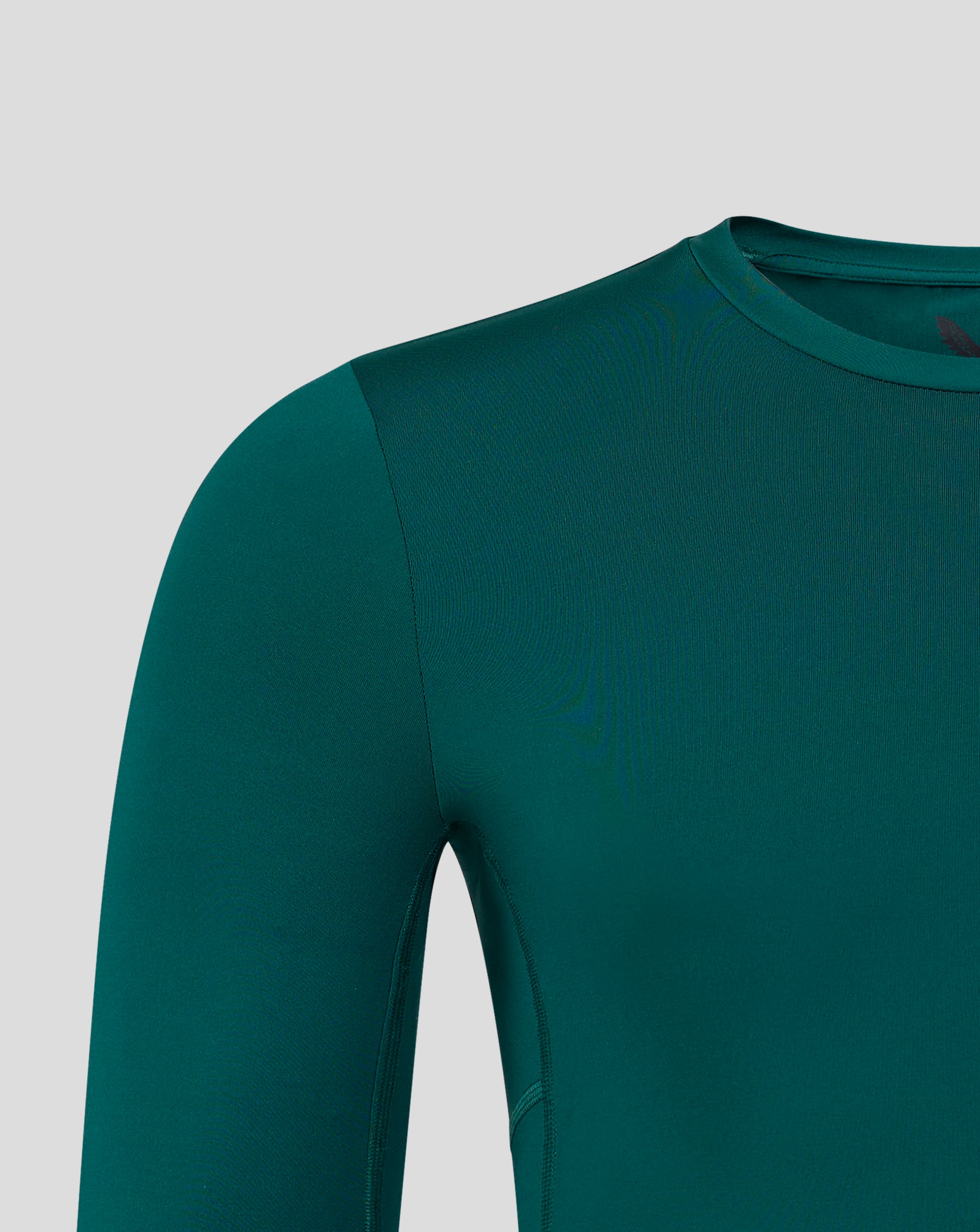 Teal Castore baselayer long sleeve top shoulder and neck detail