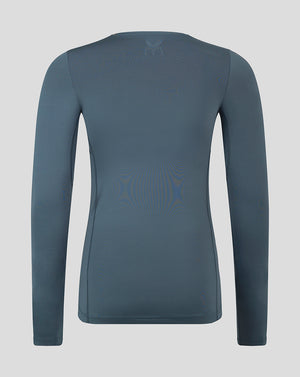 Back view of dark slate mens baselayer long sleeve top with heat sealed Castore logo at the upper back