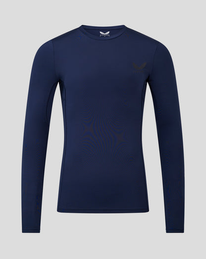 Front view of navy peacoat Baselayer long sleeve top with self fabric crew neck and heat sealed Castore logo on chest