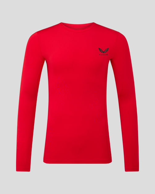 Red Baselayer long sleeve top with crew neck and underarm panels and Castore logo on chest