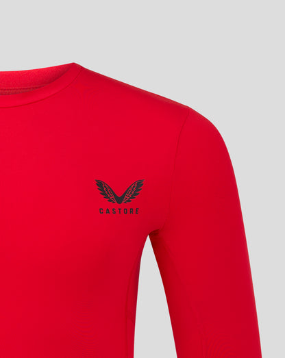 Shoulder and upper chest area of red baselayer with black Castore logo