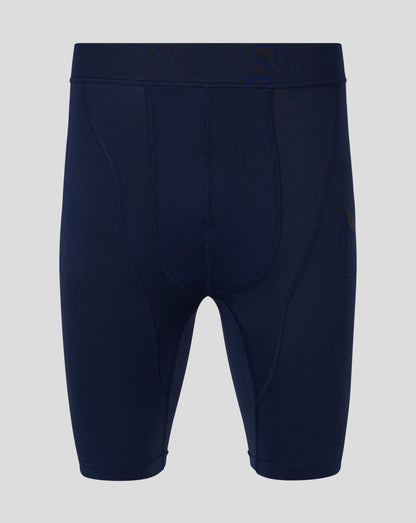 Back view of navy Baselayer leggings with self fabric waistband and panel seams