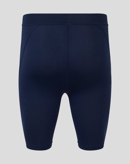 Back view of navy Peacoat Mens Baselayer Legging showing folded waistband and panel seams