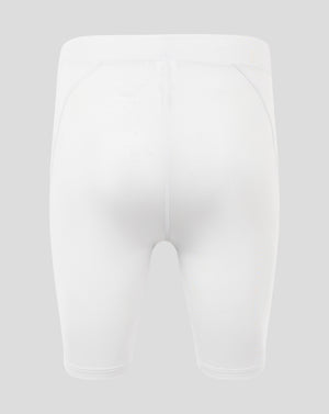 Back view of white mens baselayer shorts with high rise waistband and curved panel seams and Castore logo on the right hip