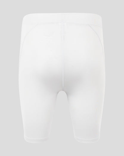 Back view of white mens baselayer shorts with high rise waistband and curved panel seams and Castore logo on the right hip