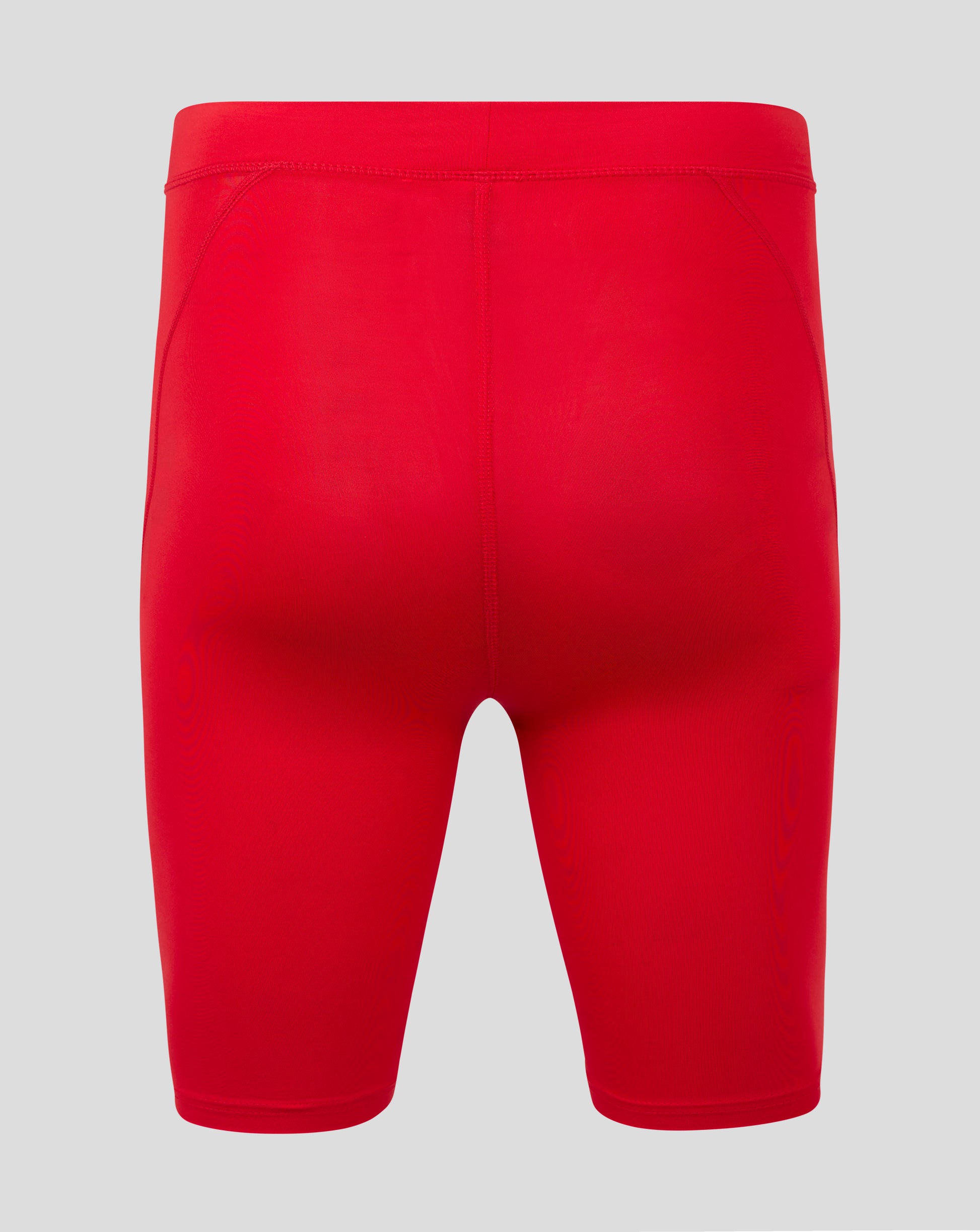 Rear view of red baselayer short showing folded waistband and flatlock seams