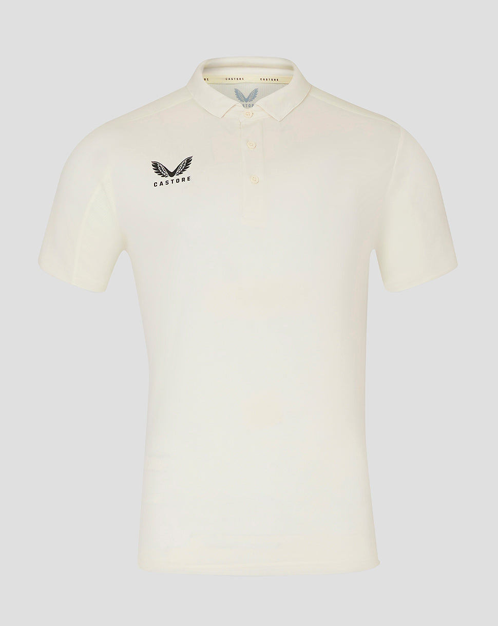 Cream cricket polo for men with short sleeves and Castore logo on the chest.