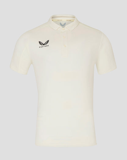 Cream cricket polo for men with short sleeves and Castore logo on the chest.