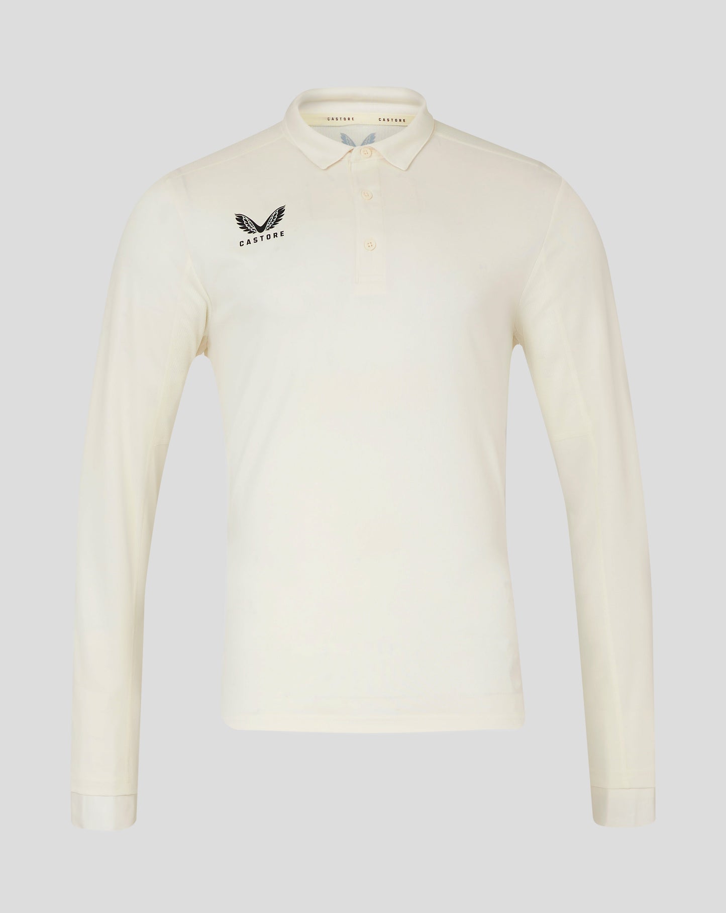 Cannoli Cream men's long sleeve cricket shirt with self fabric collar panelled shoulders and heat sealed Castore logo