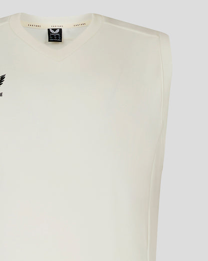 Close-up of neckline showing Castore label and logo on white sleeveless cricket vest
