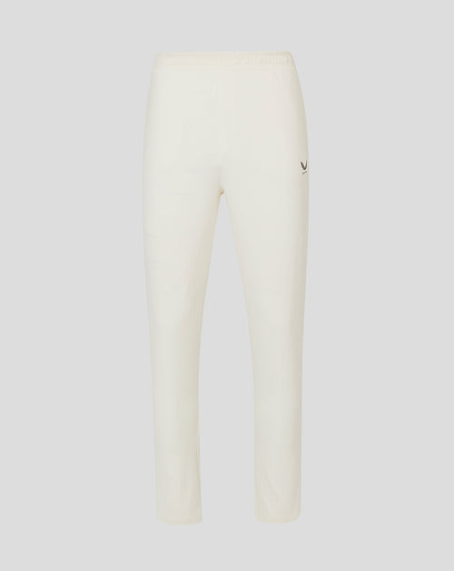 Cream cricket trousers with elastic waistband mesh panels and Castore logo on thigh
