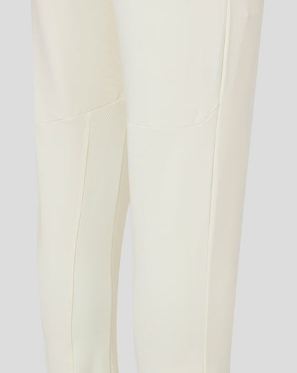 Cream men's cricket trousers close-up of leg showing mesh panel detailing