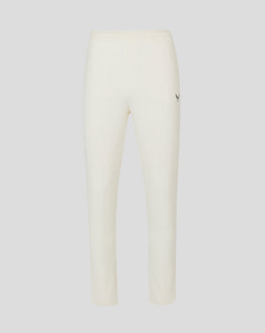 Cannoli Cream junior cricket trousers with drawcord waist mock fly front open side pocket mesh panels and heat sealed Castore logo