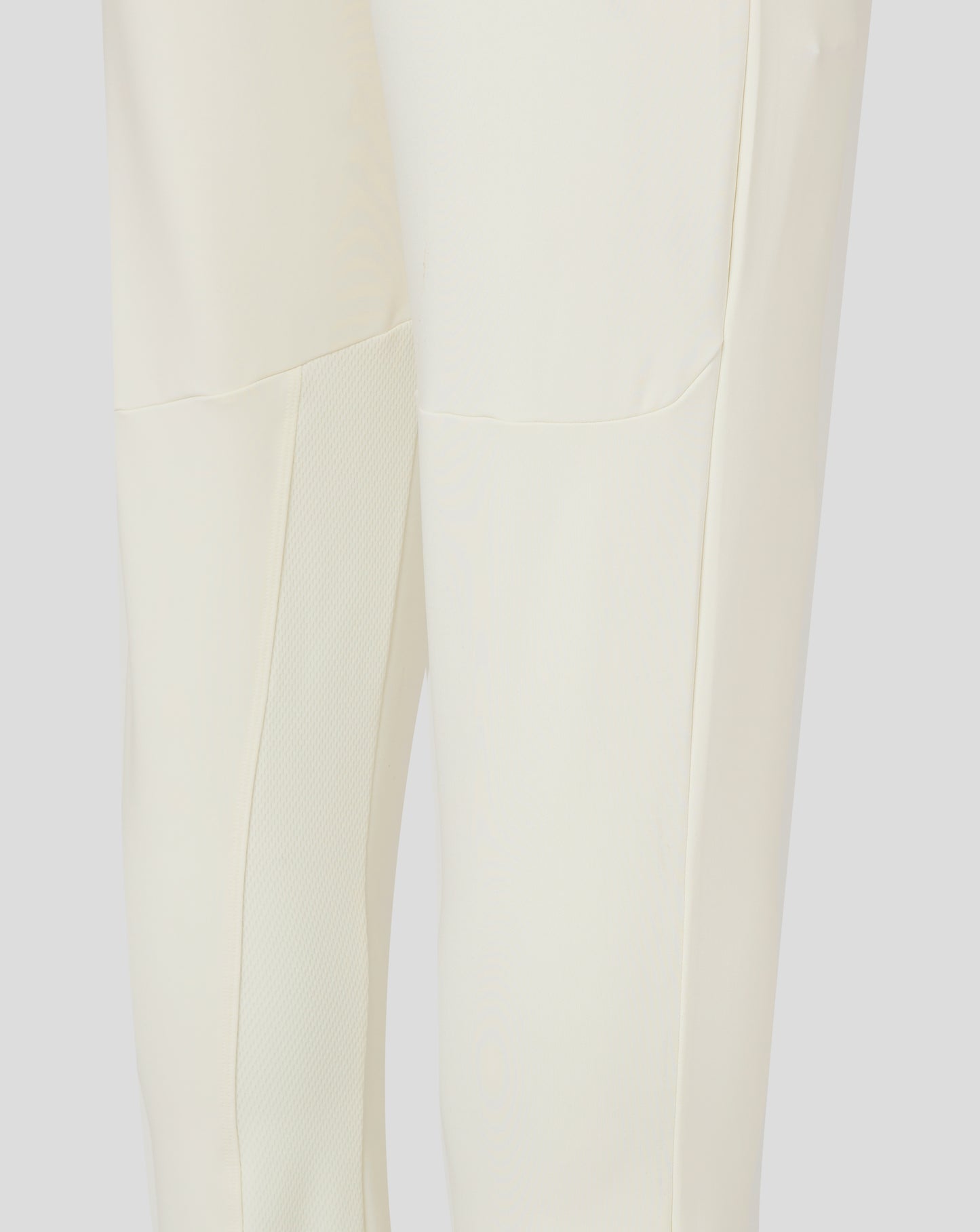Cannoli Cream junior cricket trousers back view with clean panel lines and central seam