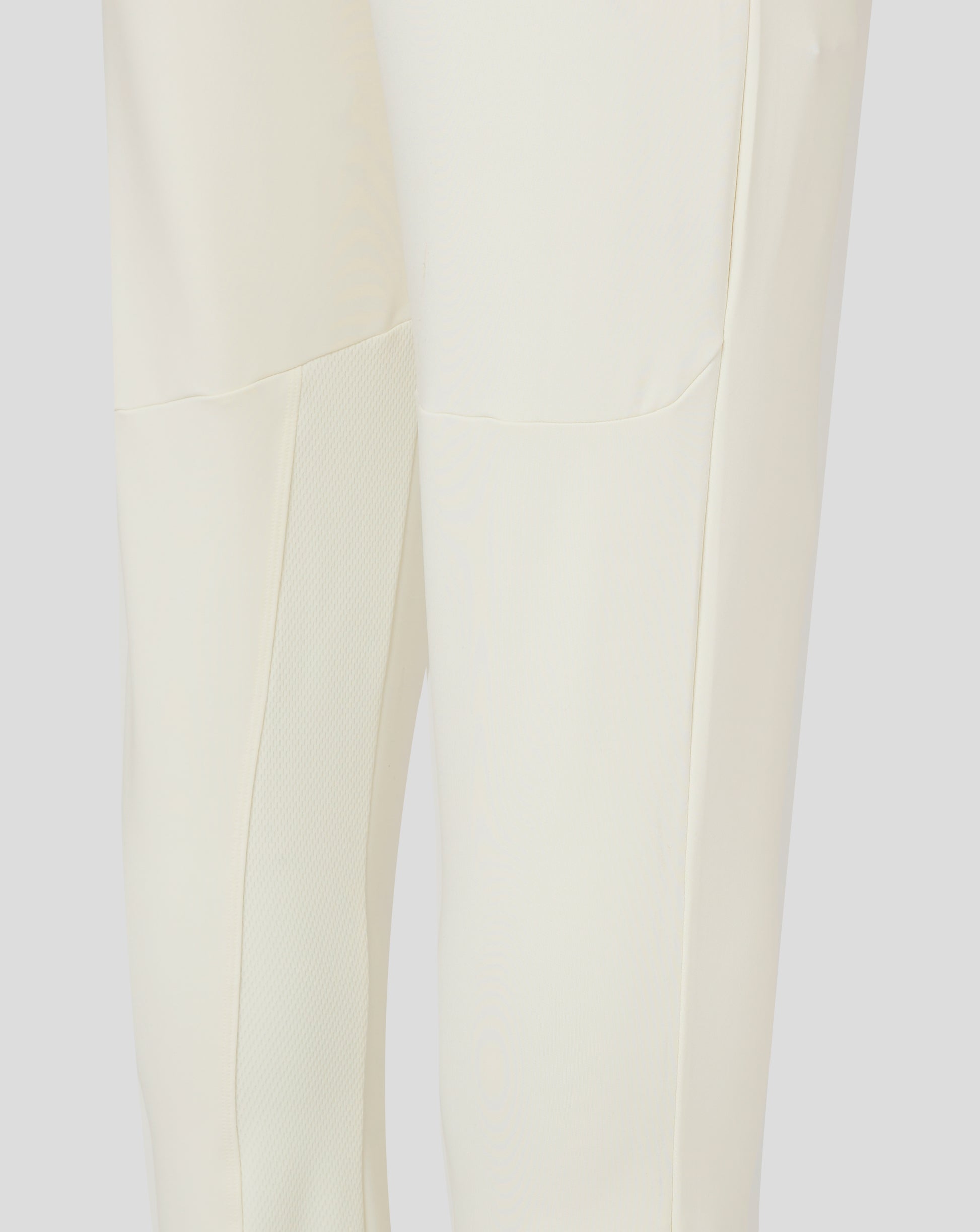Cannoli Cream junior cricket trousers back view with clean panel lines and central seam