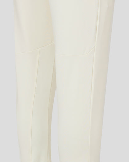 Cannoli Cream junior cricket trousers back view with clean panel lines and central seam