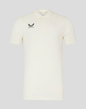 Cream short sleeve cricket tech polo with three button placket and Castore logo on chest