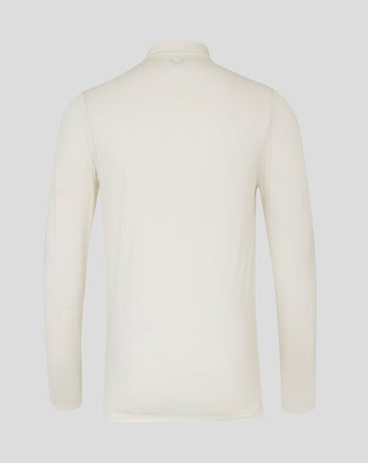 Back view of Cannoli Cream cricket long sleeve tech shirt with subtle Castore logo at the neck area