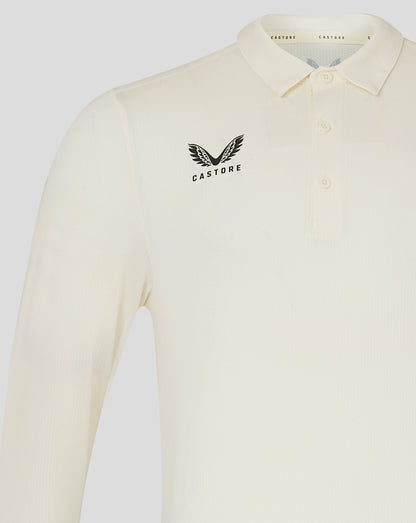 Cannoli Cream cricket shirt chest displays Castore wing logo
