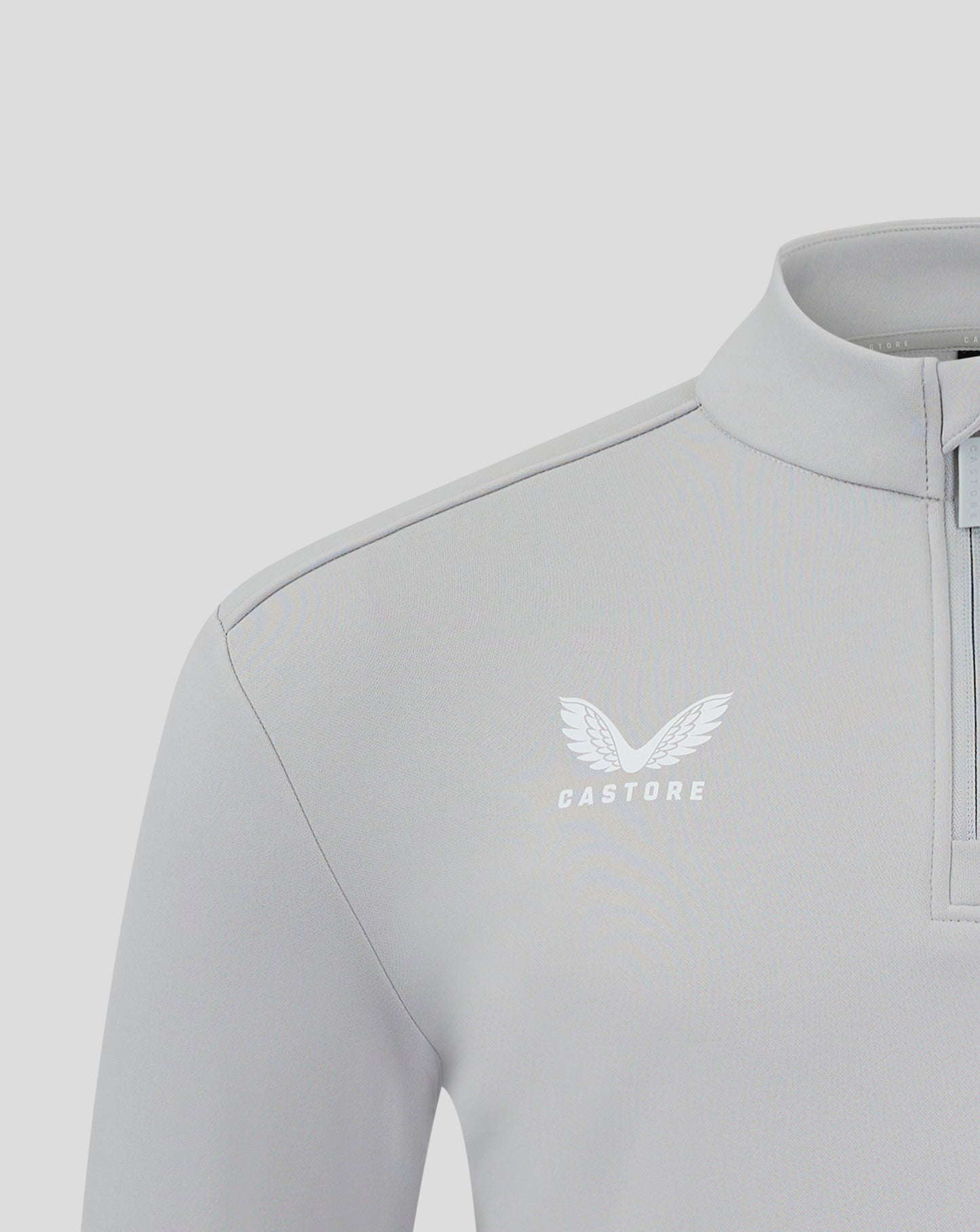 Close-up of back neck collar seam and center zipper on light gray fleece jacket