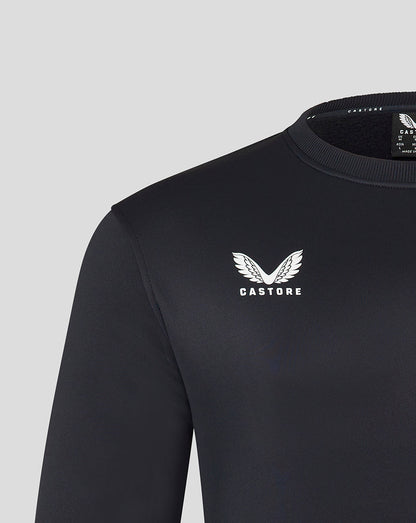 Close up of white Castore logo on left chest of black brushback sweatshirt with visible neck tag