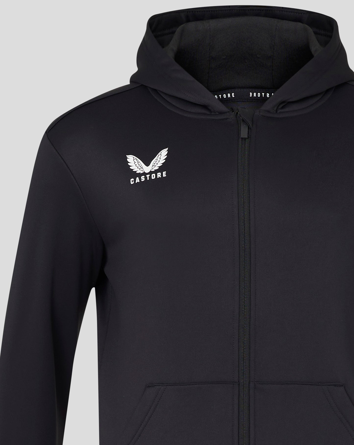 Close up of upper back neck area on black hooded sweatshirt with hood resting