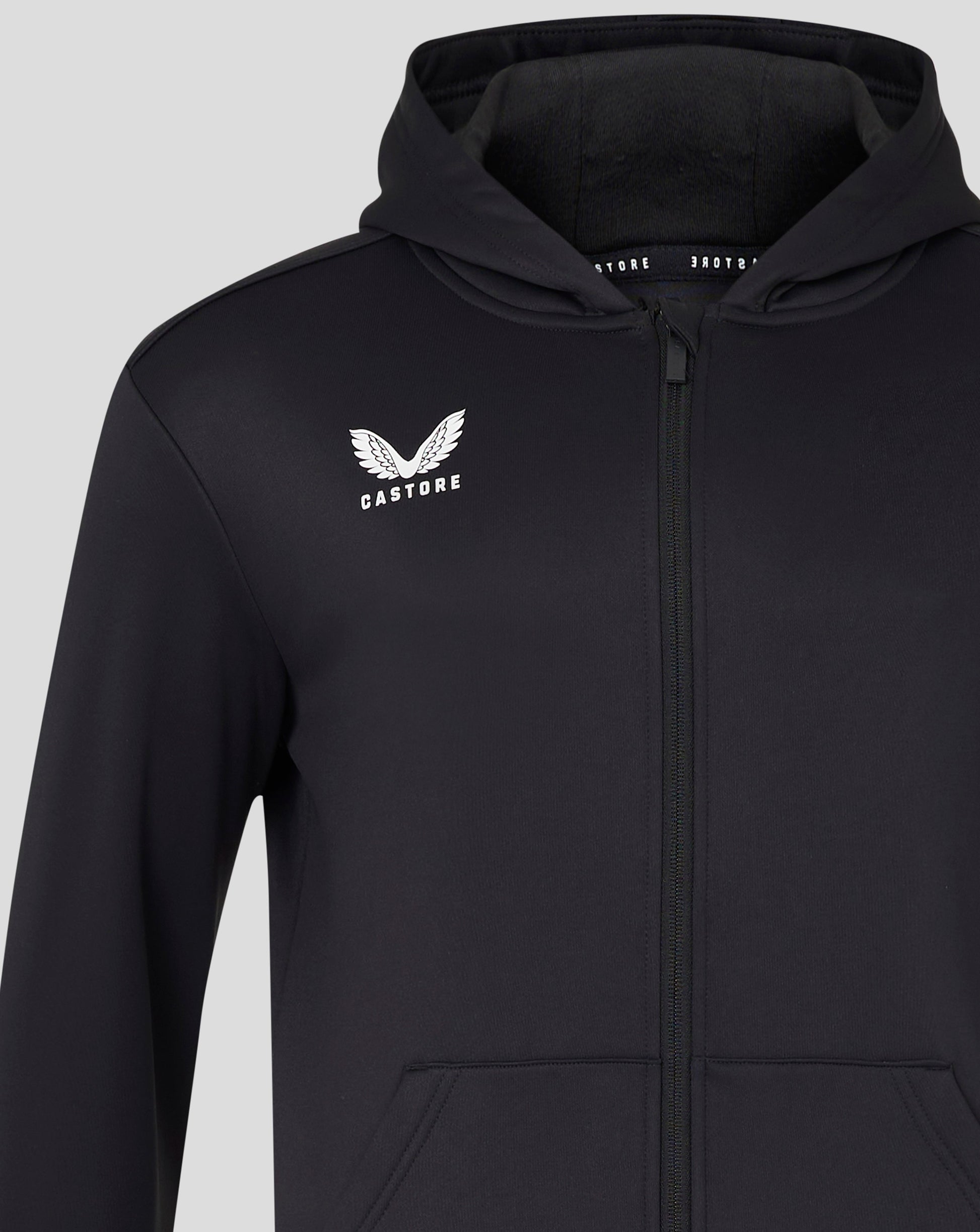 Close up of upper back neck area on black hooded sweatshirt with hood resting