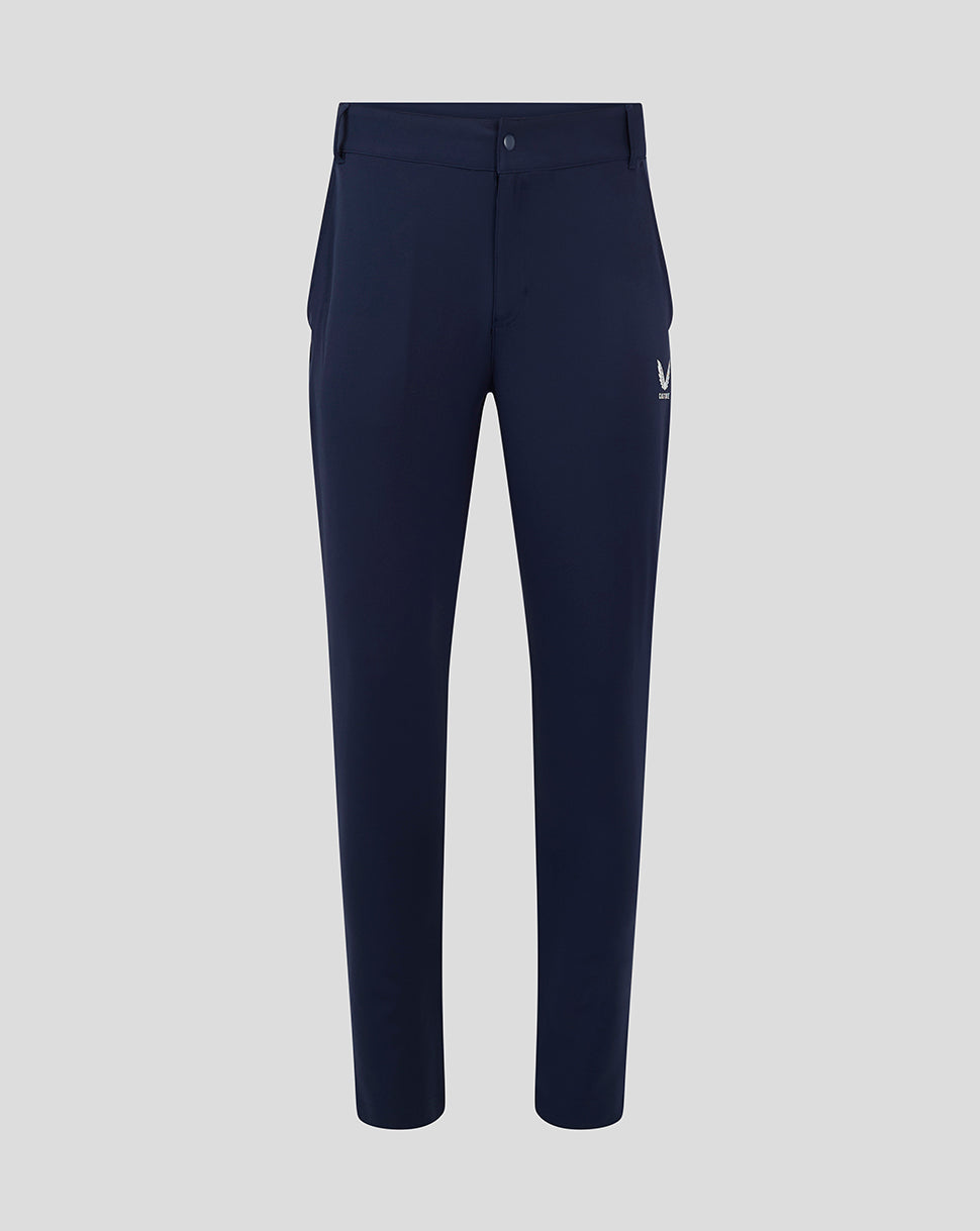Front view of navy chino pant with small winged logo on left thigh