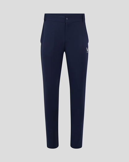 Front view of navy chino pant with small winged logo on left thigh