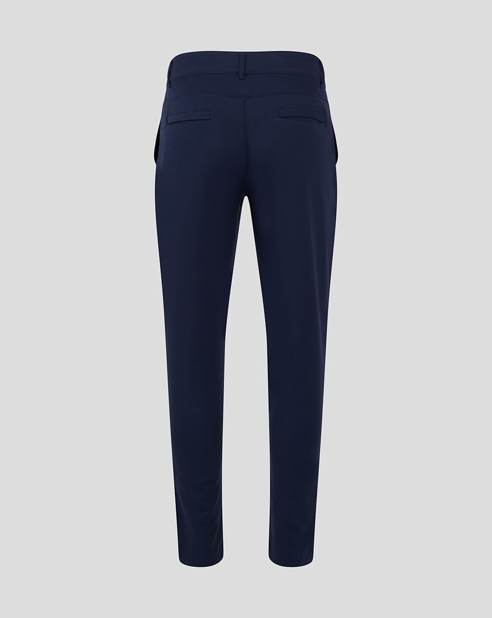 Back view of navy chino pant with belt loops and two welt pockets