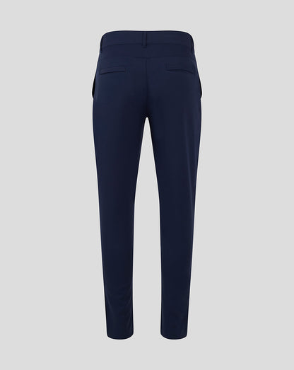 Back view of navy chino pant with belt loops and two welt pockets
