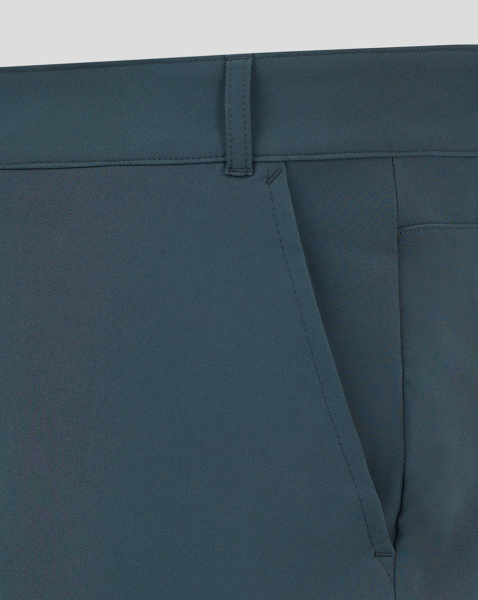 Dark slate chino shorts close-up showing waistband belt loop and angled front pocket