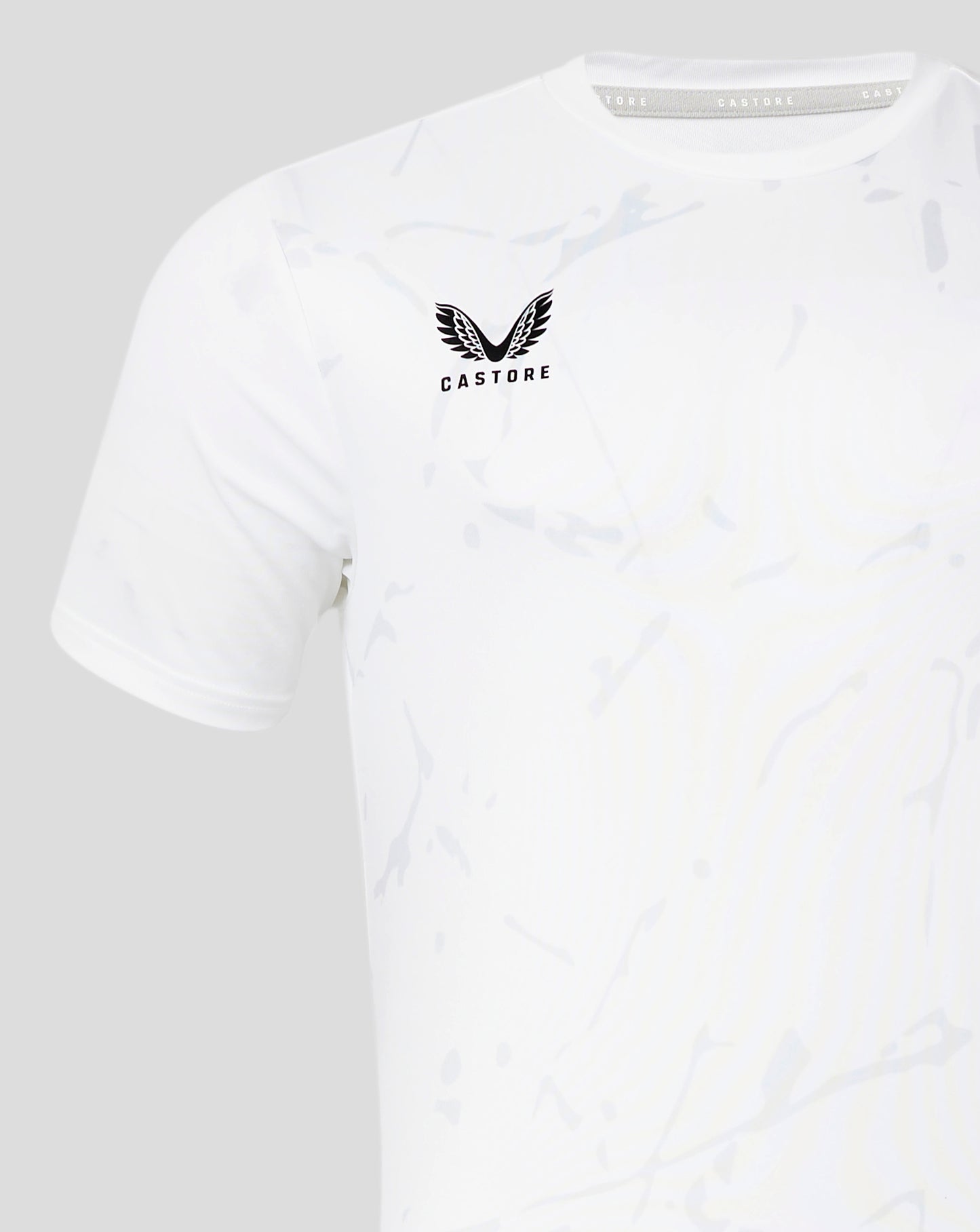 Front view of white marble printed training tee with black Castore logo on chest