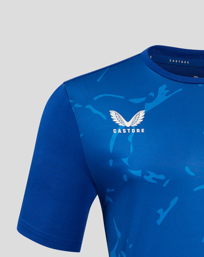 Close up of blue Marble Performance Tee shoulder and chest area with white Castore wing logo and abstract print