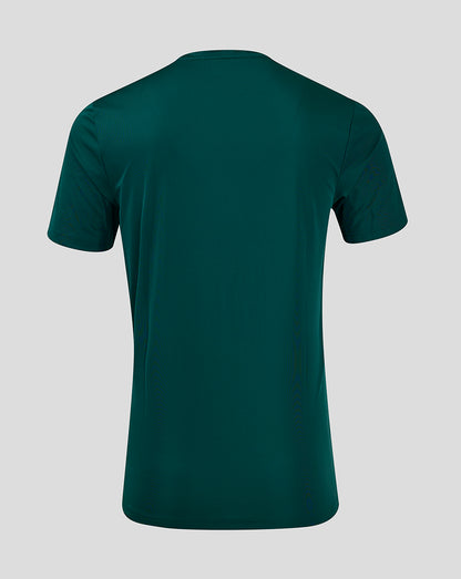 Back view of a dark green ss Linear Printed Training Tee 5 Botanical Garden Bayberry