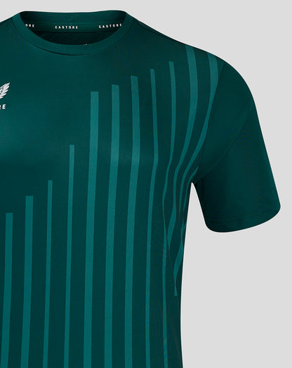 Shoulder and upper torso close up displaying teal vertical stripes sweeping across the dark green fabric