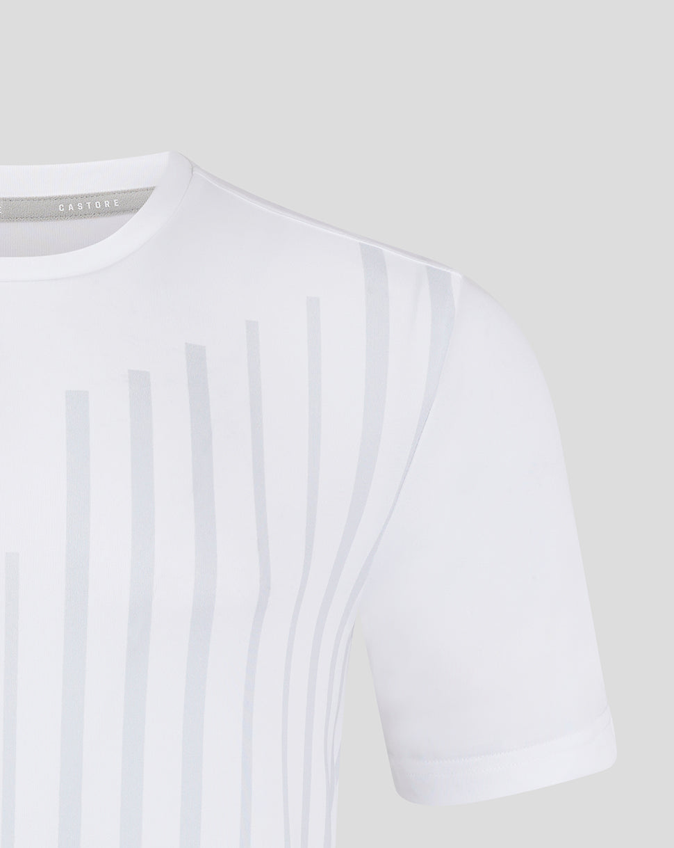 White junior training T shirt with pale vertical stripes on the front