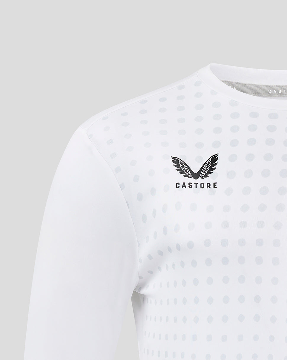 Brilliant white training tee with a light gray dot print and Castore wing logo on the chest.