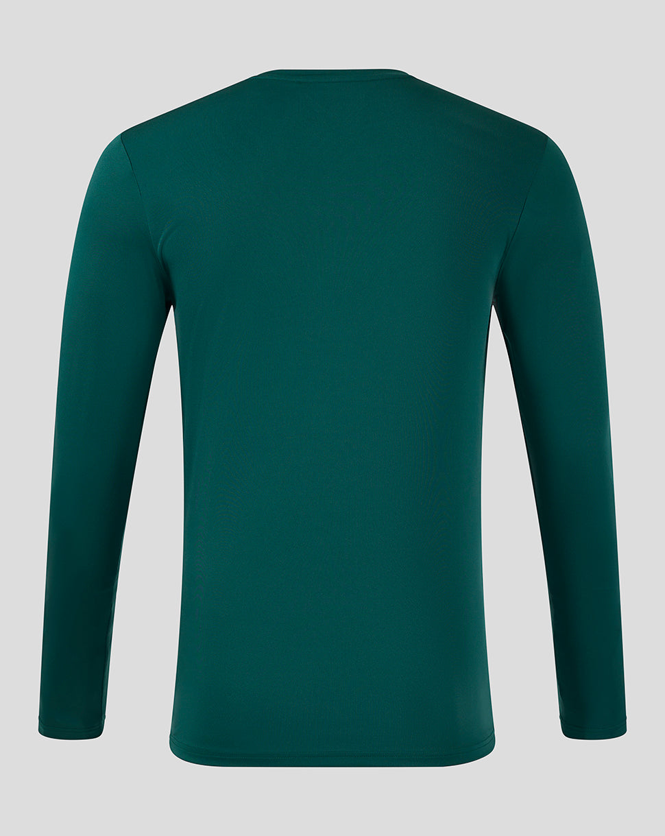 Back view of teal long sleeve training tee with a smooth solid back and clean hem.