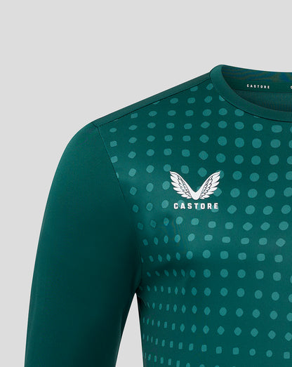 Teal training tee with a dotted gradient pattern and white Castore wing logo on the chest.