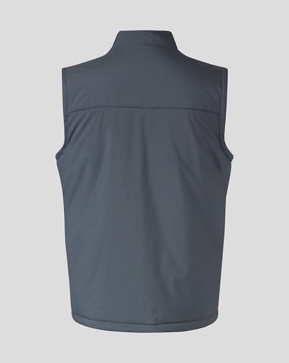 Back view of a navy sleeveless training gilet with chevron panels