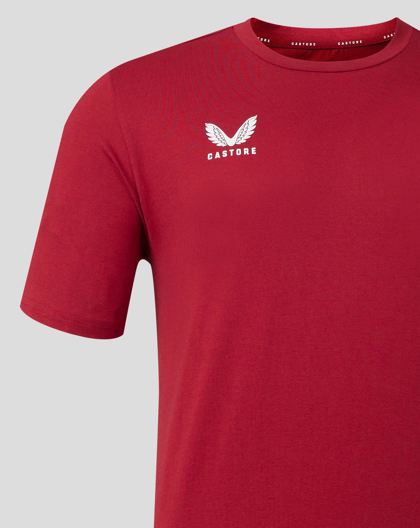 Biking red cotton leisure tee with a white Castore logo on the chest.