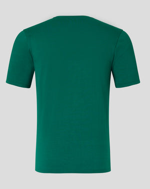 Back view of emerald green men's cotton leisure tee showing crew neck and forward shoulder seam.