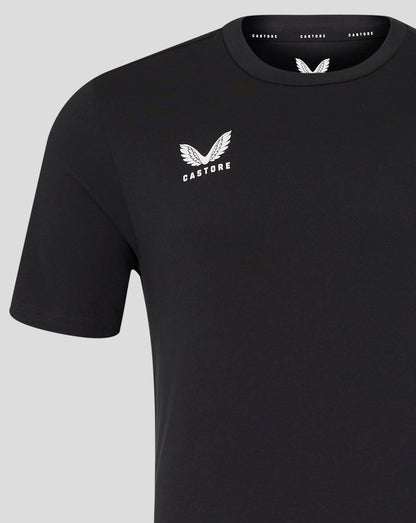 Close up of front left chest white wing Castore logo on black tee.